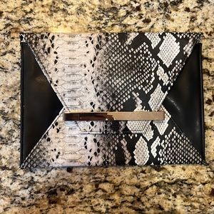 Black and white snakeskin clutch